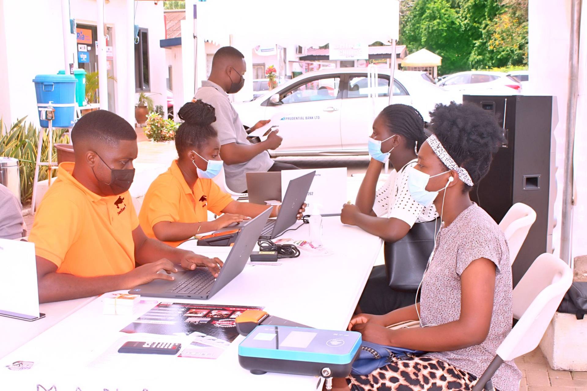 TranSoniCa agents registering card holders on campus
